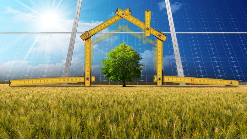 outline of a building in front of solar panels