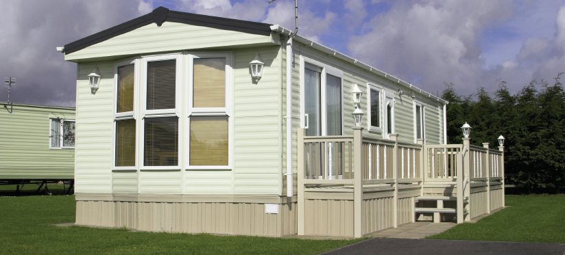 An image of a cream-colored manufactured home.