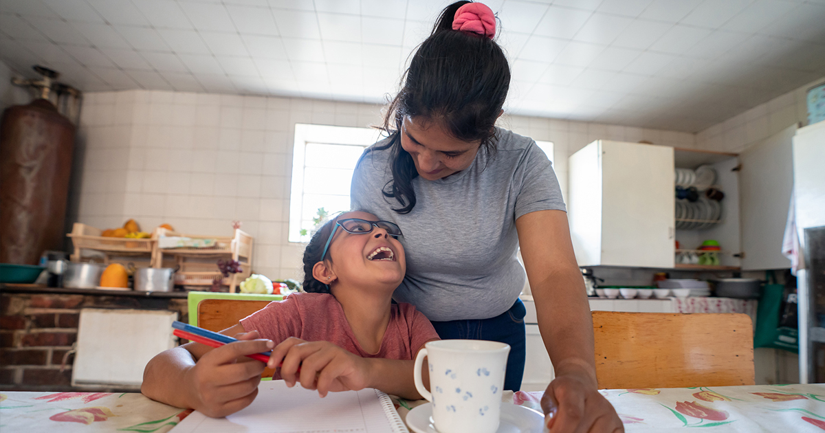 A mother and her child at home