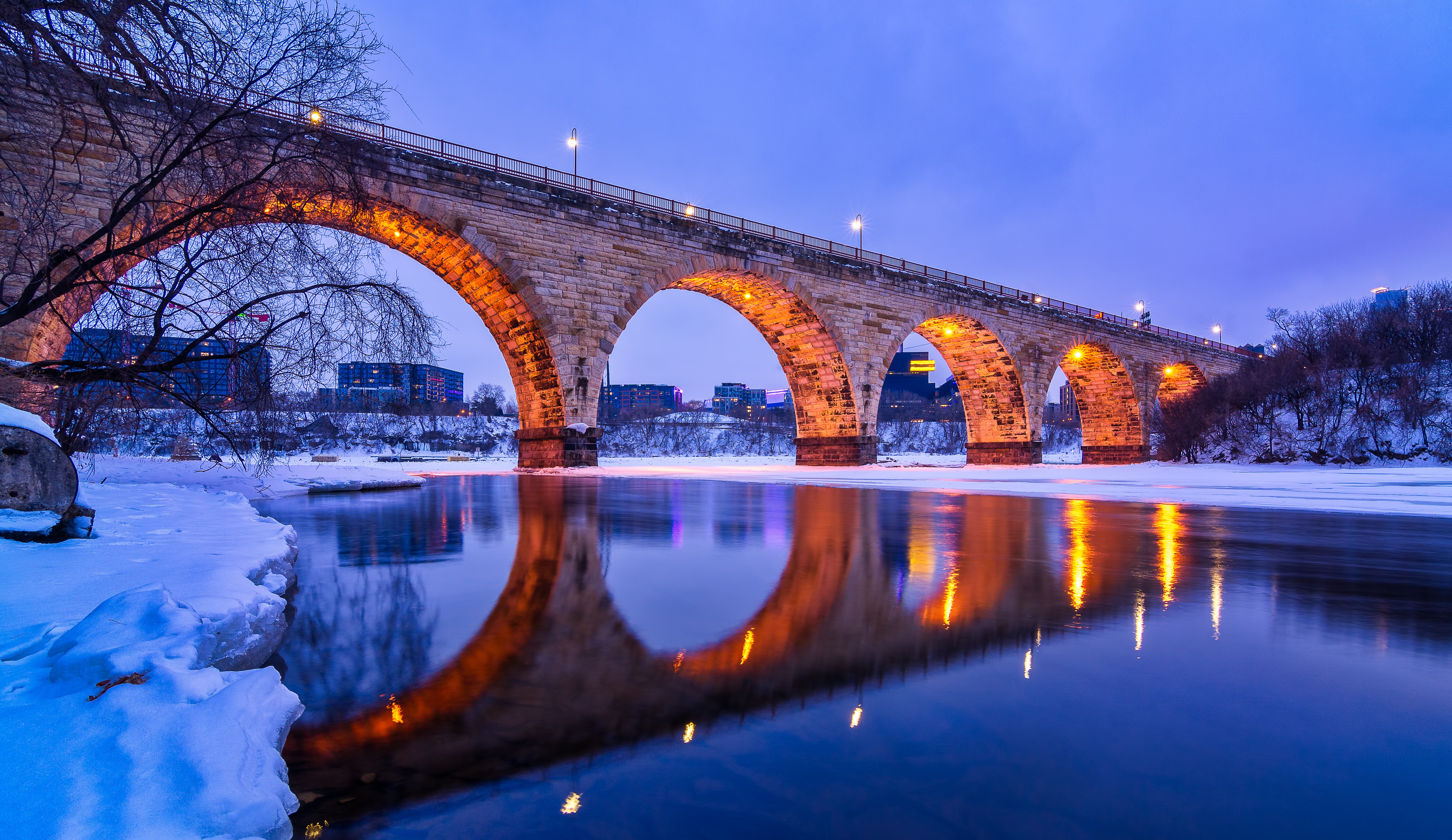 The Stone Bridge in Minneapolis, Minnesota, lit up during the winter