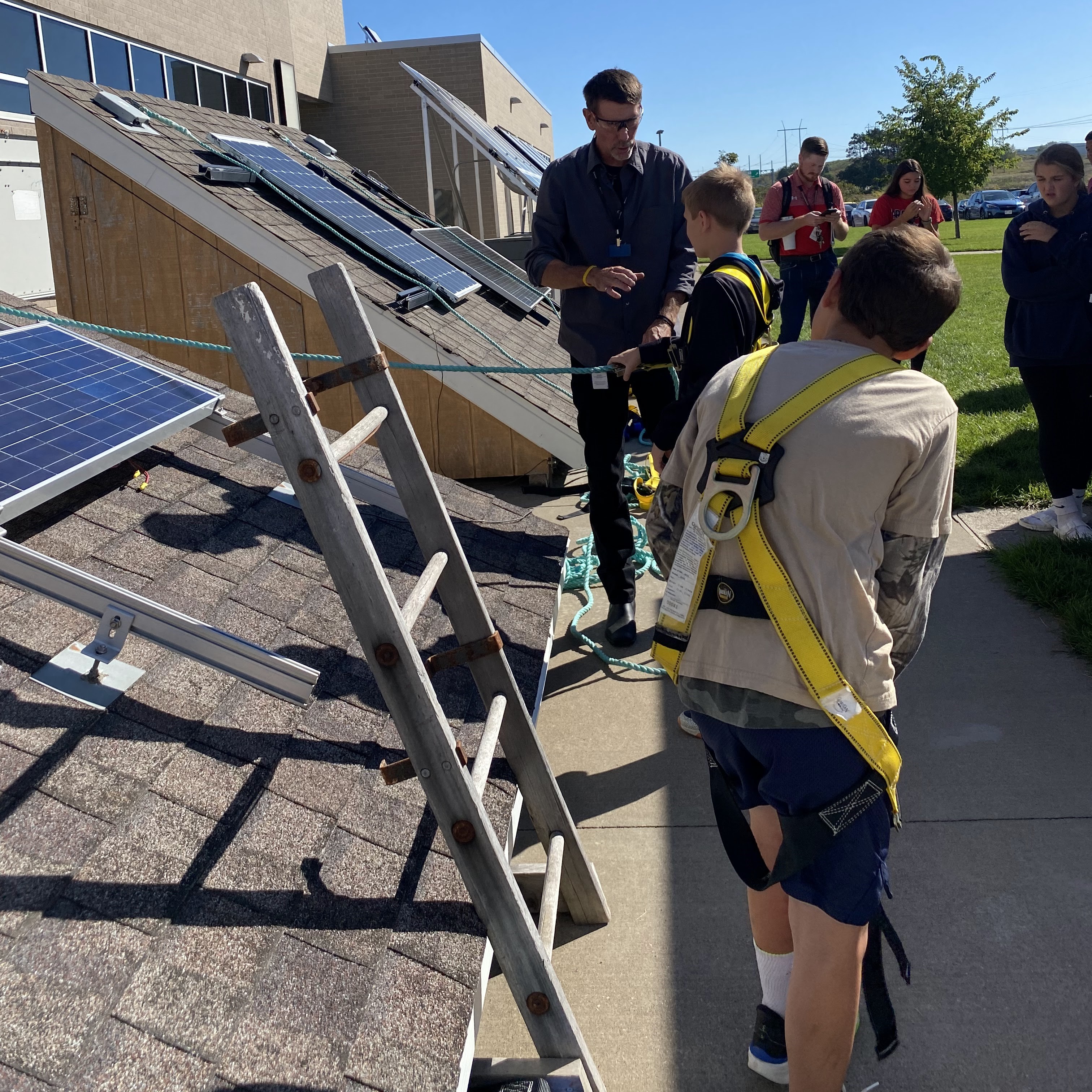 Students about to participate in the solar panel installation challenge